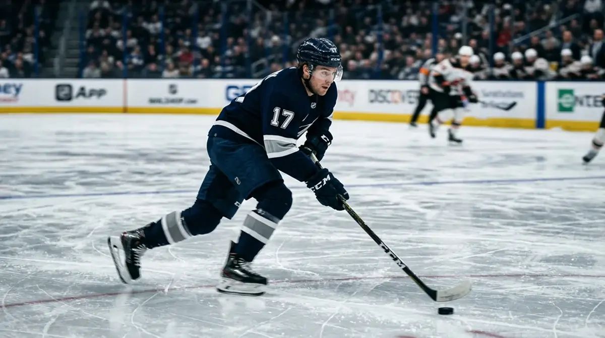Fast-moving NHL skater with motion blur captured during live game action