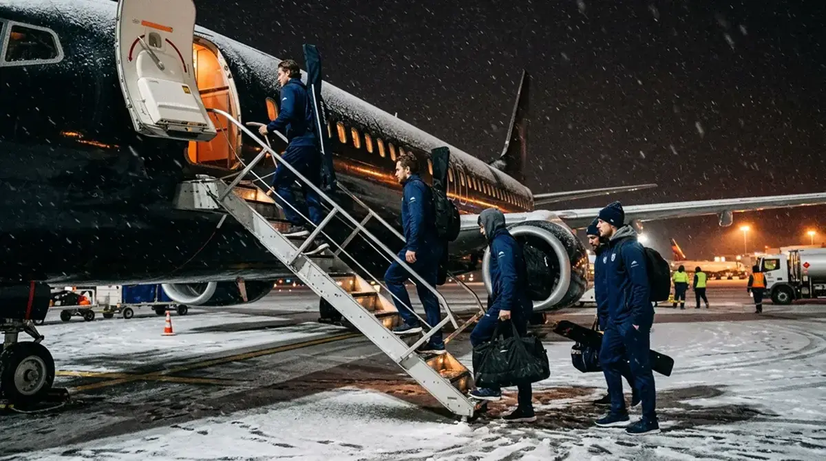 NHL team boarding plane for travel between consecutive away games